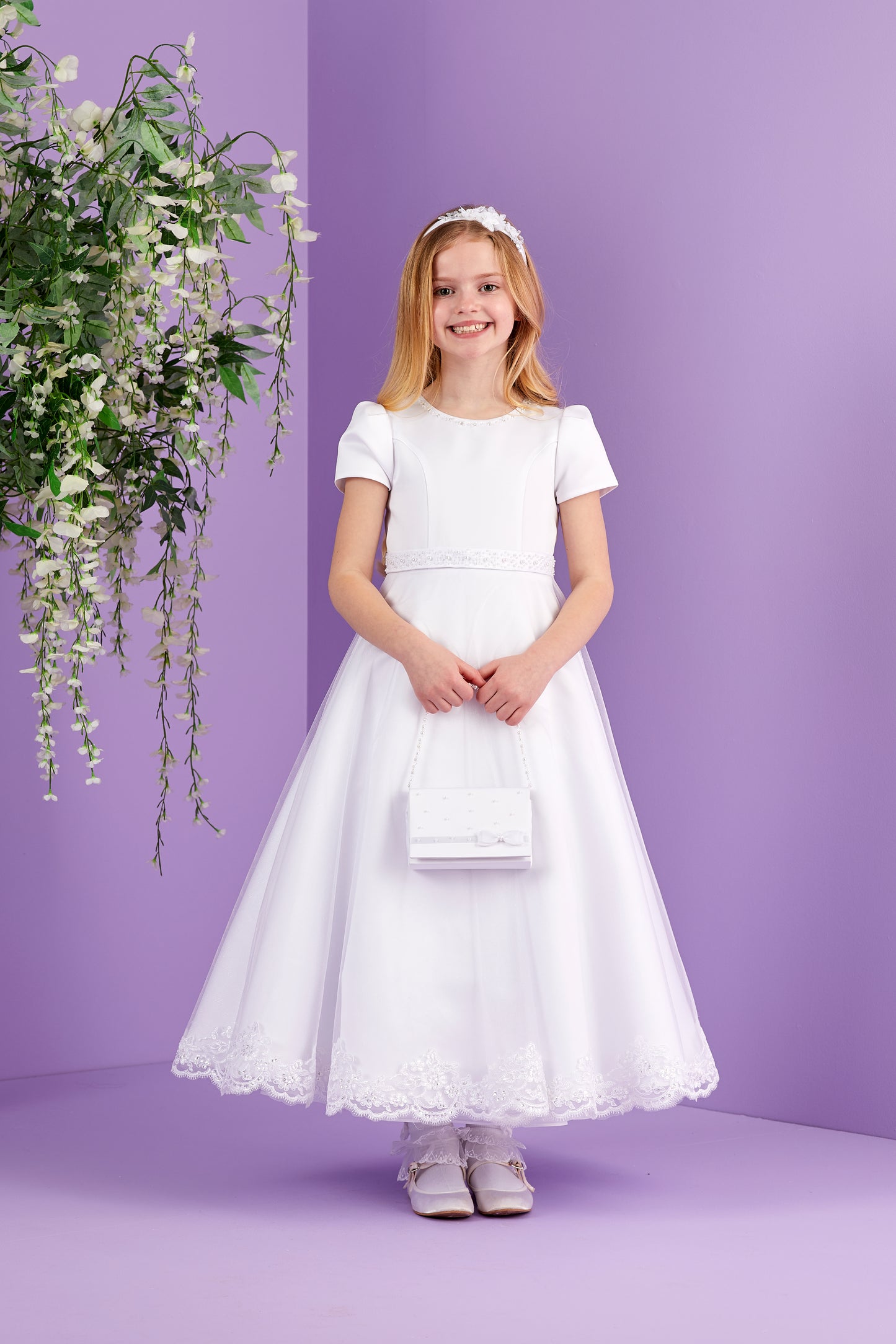 Petra White Short Sleeved Holy Communion Dress with a Lace Edged Sparkle Net Skirt Available October 2026
