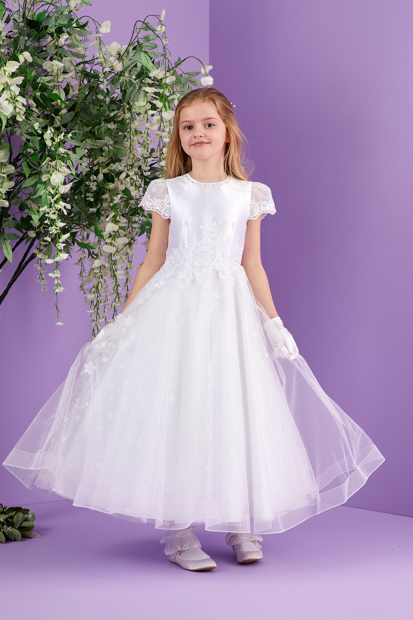 Leona Short Sleeve White Holy Communion Dress with Sparkle Skirt and Guipure Motifs  Available October 2026